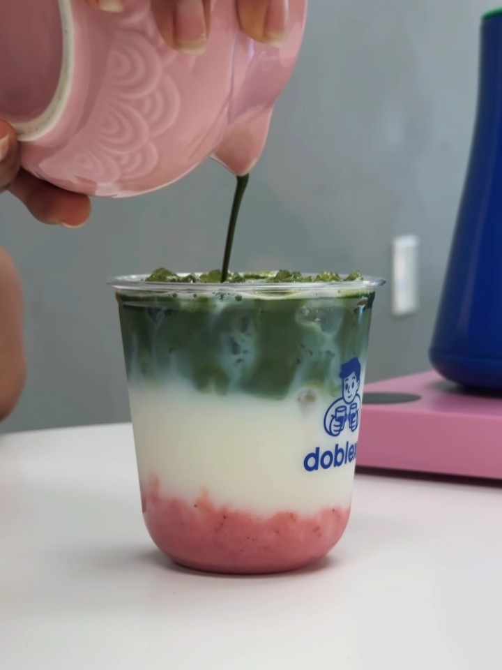 Matcha being poured into a cup